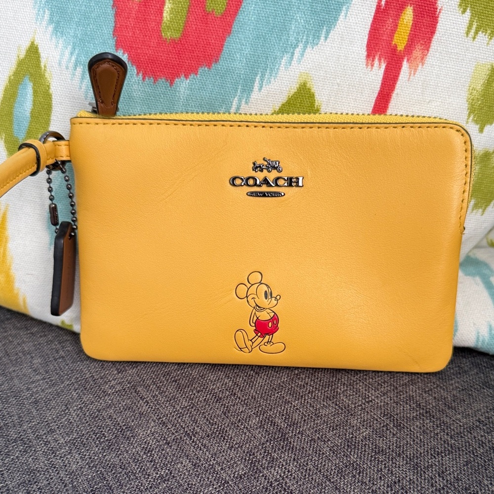 Coach Yellow Mickey Mouse Wristlet.   Brand new with tags!   Rare!